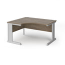 Dams Vivo ergonomic desk in Nebraska Oak finish with spacious surface and modern design for home or office workspace.