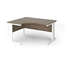 Dams Vivo Ergonomic Desk in Nebraska Oak finish with sleek design and smooth surface for comfortable workspace.