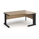 Dams Vivo ergonomic desk in Kendal Oak finish, showing the spacious wooden work surface and sturdy metal frame.
