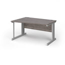 Dams Vivo Wave Desk in Grey Oak finish, showcasing its modern curved design and smooth surface for a stylish workspace.