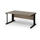 Vivo Wave Desk in Nebraska Oak by Dams, showcasing a modern, curved wooden workspace with sleek design and natural wood finish.
