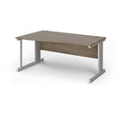 Vivo Wave Desk in Nebraska Oak with sleek modern design, featuring smooth surface and sturdy wooden frame from Dams Furniture.