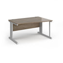 Dams Vivo Wave Desk in Nebraska Oak with curved edge design and smooth wood finish for modern workspace comfort.