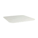 Square white marble table top from ZAP's Extrema Premium collection, showcasing smooth polished surface and elegant veining.
