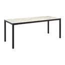 Extrema black 4-leg dining table by ZAP with Carrara marble top, modern design, sturdy black metal legs, and elegant surface.