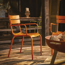 Dark ochre ZAP Marlow armchair with plush fabric and modern design, featuring cushioned armrests and stylish wooden legs.
