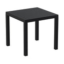 Black Ares dining table by ZAP with sleek design, shown with matching black dining chairs in a modern dining room setting.
