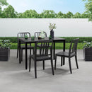 ZAP EKO recycled side chair with a rectangular seat and wooden legs, shown in a modern dining setting.