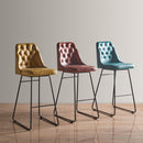 ZAP Harland leather bar stool with a padded seat and backrest, featuring sleek modern design and sturdy wooden legs.