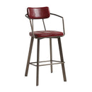 Vintage red Auzet bar stool by ZAP featuring a classic design with a sturdy metal frame and a comfortable wooden seat.