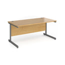 Dams Contract 25 800mm deep oak straight desk with cantilever legs, showcasing a modern office workspace with clean lines.
