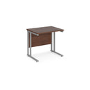 Dams Maestro 25 walnut 600mm deep straight desk with silver cantilever legs, showcasing a modern office workspace design.