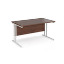 Dams Maestro 25 walnut straight desk with 800mm depth and cantilever legs, shown in a white room setting.