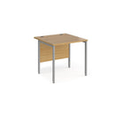 Dams Maestro 25 800mm deep straight desk with H-frame legs in oak finish, featuring a sleek modern design and sturdy construction.