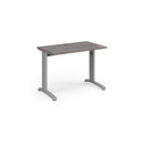 Dams TR10 600mm deep straight desk in grey oak finish with sleek tabletop and sturdy legs, ideal for modern office spaces.
