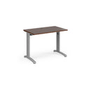 Dams TR10 600mm deep straight desk in walnut finish with a sleek, modern design and smooth surface for workspace organization.