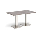 Dams Brescia rectangular dining table with flat square base in grey oak finish, modern design, shown from a side angle.