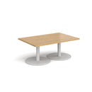 Dams Monza rectangular oak coffee table with flat round base, modern design, smooth wooden surface, and sturdy construction.