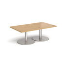 Dams Monza rectangular coffee table with oak finish, flat round base, modern design, and smooth wooden surface.