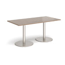 Dams Monza rectangular dining table with flat round base in Barcelona Walnut wood, showcasing sleek modern design.