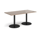 Dams Monza rectangular dining table with flat round base in Barcelona Walnut wood, showcasing a modern, sleek design.