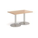 Dams Monza rectangular dining table with flat round beech wood base, modern design, shown in a stylish dining room setting
