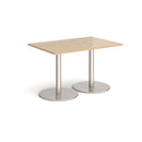 Dams Monza rectangular dining table with flat round base in Kendal Oak wood finish, showcasing its sleek modern design.
