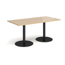 Dams Monza rectangular dining table with flat round base in Kendal Oak wood, modern design, sleek surface, and sturdy construction.
