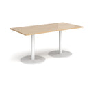 Dams Monza rectangular dining table with flat round base in Kendal Oak wood finish, showcasing a modern design with smooth surfaces.