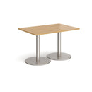 Dams Monza rectangular dining table with flat round oak base, showcasing the sleek wood finish and modern design.