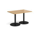 Dams Monza rectangular oak dining table with flat round base, showcasing a sleek wooden surface and modern design.