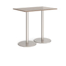 Dams Monza rectangular poseur table with Barcelona Walnut finish, featuring a flat round base and modern design.