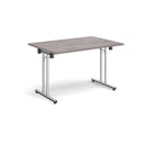 Grey oak rectangular folding leg table with straight foot rails by Dams, showing the tabletop and sturdy folding legs.