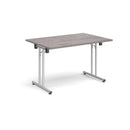 Grey oak rectangular folding leg table with straight foot rails by Dams, showcasing its sturdy design and foldable feature.