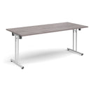 Dams rectangular folding leg table with straight foot rails in grey oak finish, showing its sturdy legs and smooth surface.
