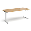 Dams rectangular folding leg table with straight foot rails in oak, featuring a silver finish and sturdy design.