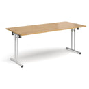 Dams rectangular folding leg table with straight foot rails in oak, showcasing its sturdy design and smooth white finish.