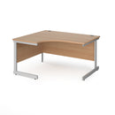 Dams Contract 25 ergonomic desk with cantilever leg in beech finish, shown from left side with graphite frame and spacious workspace.
