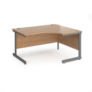 Dams Contract 25 ergonomic desk with cantilever leg, beech finish and graphite frame, shown from the left side.