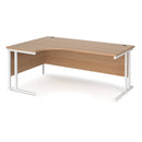 Dams Maestro 25 ergonomic desk with cantilever leg in beech wood finish, shown from the left side.