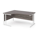 Dams Maestro 25 ergonomic desk with grey oak finish and cantilever leg, shown from the left side in white.
