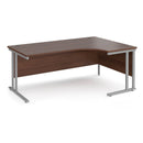 Dams Maestro 25 ergonomic desk with walnut finish and cantilever leg, shown from the right-hand side.