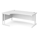 White Dams Maestro 25 ergonomic desk with cantilever leg, shown from the left side, featuring a sleek, modern workspace design.