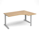 Dams TR10 ergonomic oak desk with spacious work surface and modern design, featuring sturdy wooden legs and a sleek finish.