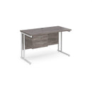 Dams Maestro 25 straight desk in grey oak and white with 600mm depth, fixed 2-drawer pedestal, and cantilever leg design.