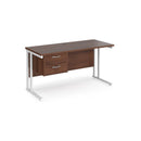 Dams Maestro 25 straight desk in walnut and white with 600mm depth, fixed 2-drawer pedestal, and cantilever legs.
