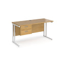 Dams Maestro 25 straight desk with oak-white finish, 600mm deep, fixed two-drawer pedestal, and cantilever legs.