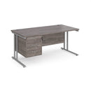 Dams Maestro 25 straight desk in grey oak with 800mm depth, fixed 3-drawer pedestal, and cantilever legs.