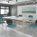 White Fuze rectangular boardroom table by Dams with two cut-outs for cable management, shown from a front angle.