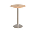 Dams Monza circular poseur table with beech finish and central circular cut-out, modern design for social spaces.